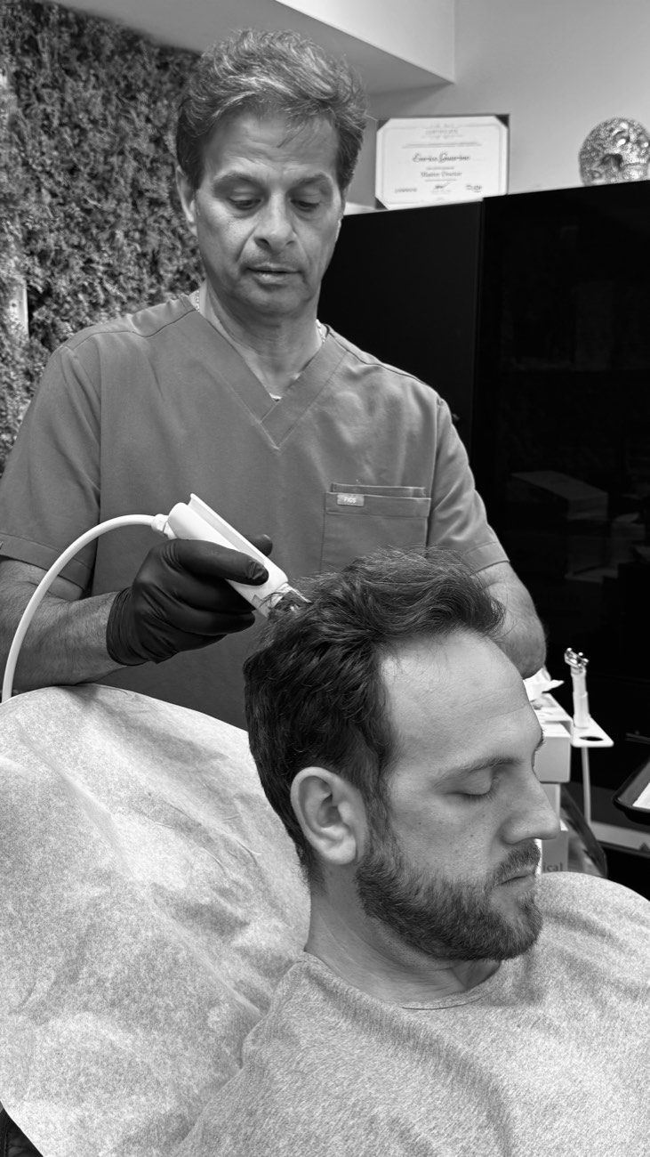 Dr. Guarino performing a treatment on a client